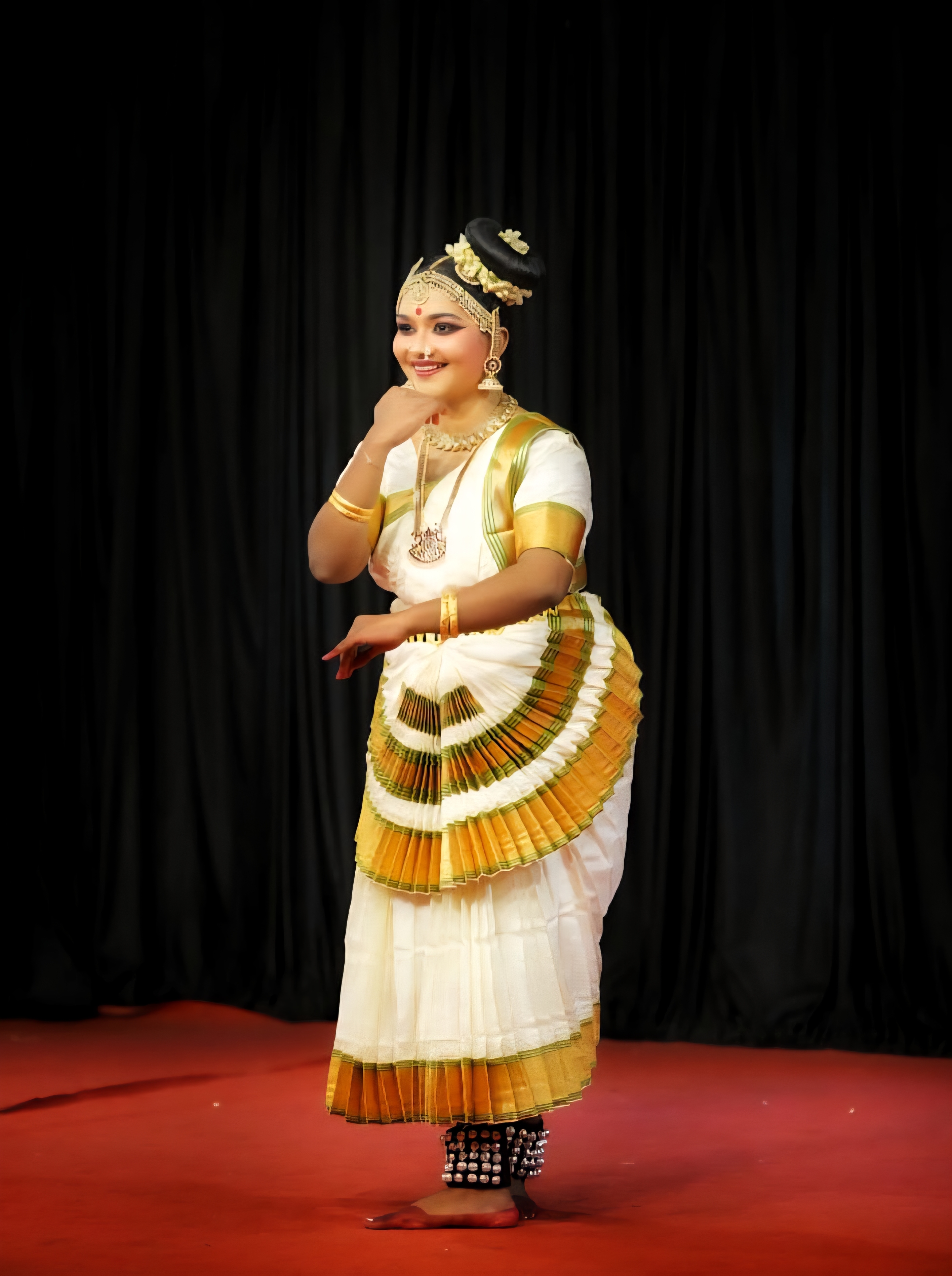 Guru Mala Devi teaching students
